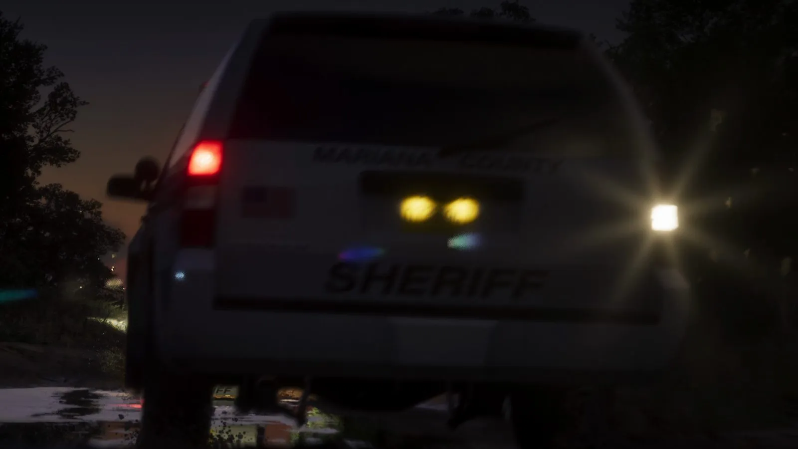 Машина с надписью SHERIFF на ночной дороге · кадр третьего трейлера GTA 6 (15 октября 2026), 1:11 — GTA 6